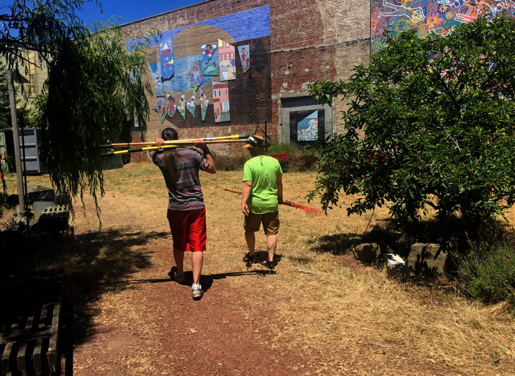 Volunteers clean up downtown Richmond park ahead of summer