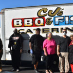 Homeless at Hilltop hotel served BBQ feast by community volunteers Homeless at Hilltop hotel served barbecue feast by community members