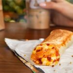 Taco Bell to offer free breakfast burritos on Thursday Taco Bell is giving consumers a craveable reason to celebrate waking up in the morning in the form of a free Toasted Breakfast Burrito at Taco Bell restaurants nationwide on October 21 from 7-11 AM.