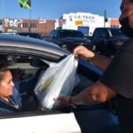 300 turkey dinners distributed from Phila Burger Station parking lot 300 turkey dinners distributed to community from Phila Burger Station lot