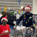 Richmond youth ‘Shop With a Cop’ at Walmart Richmond youth 'Shop With a Cop' at Walmart