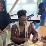 Olympian stops by Nystrom Elementary to read to students Olympian stops by Nystrom Elementary to read to students