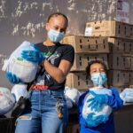 The Black Neighborhood preps for 8th Annual ‘Turkey Giveaway’