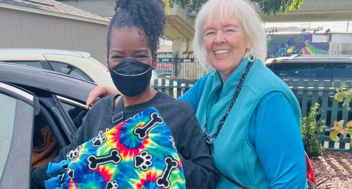 MLK Day of Service volunteers make blankets and art for locals in need
