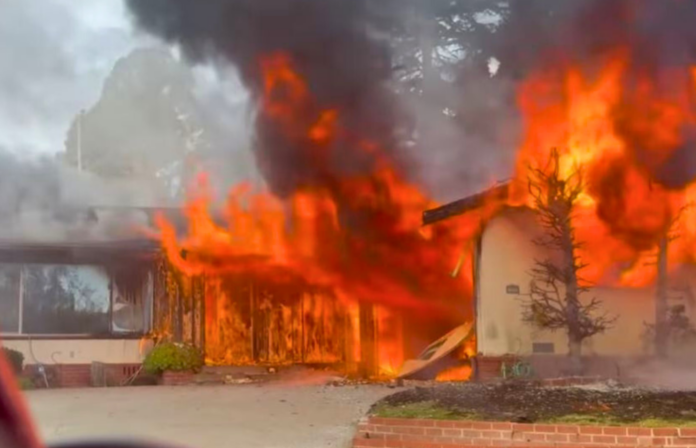 Richmond house fire doused before spreading to nearby home