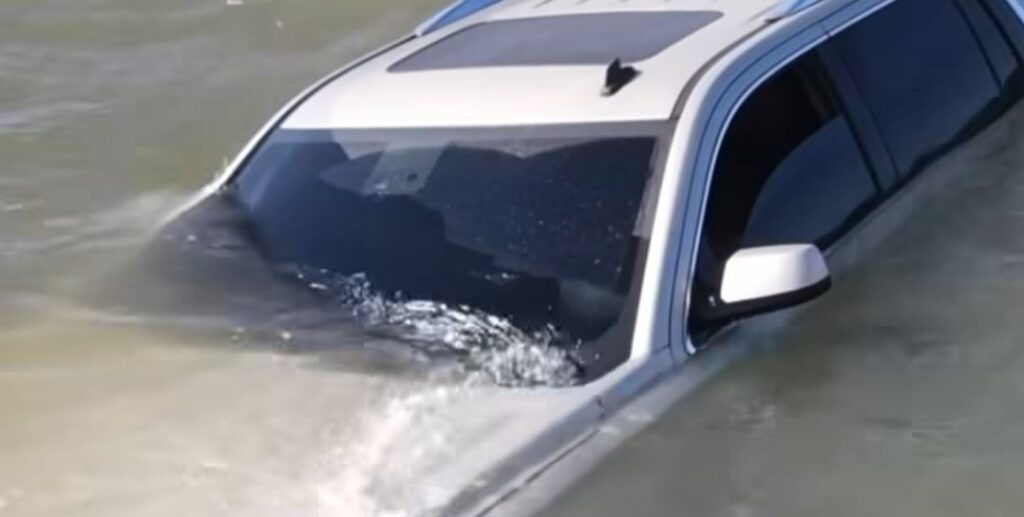 Police drone used to ensure car found submerged in Bay was unoccupied