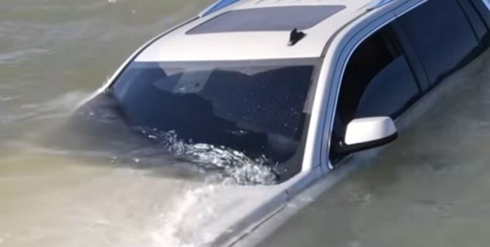 Police drone used to ensure car found submerged in Bay was unoccupied