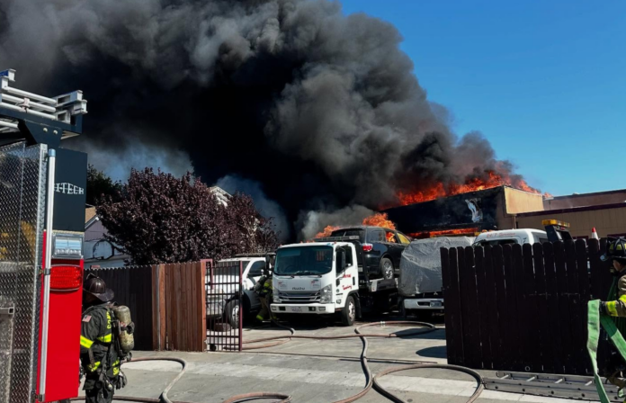 Richmond fire crews contain blaze at auto shop