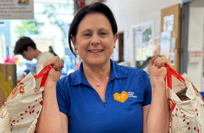 WPE-Home-Woman-2 Nuvision and White Pony Express launch July clothing drive