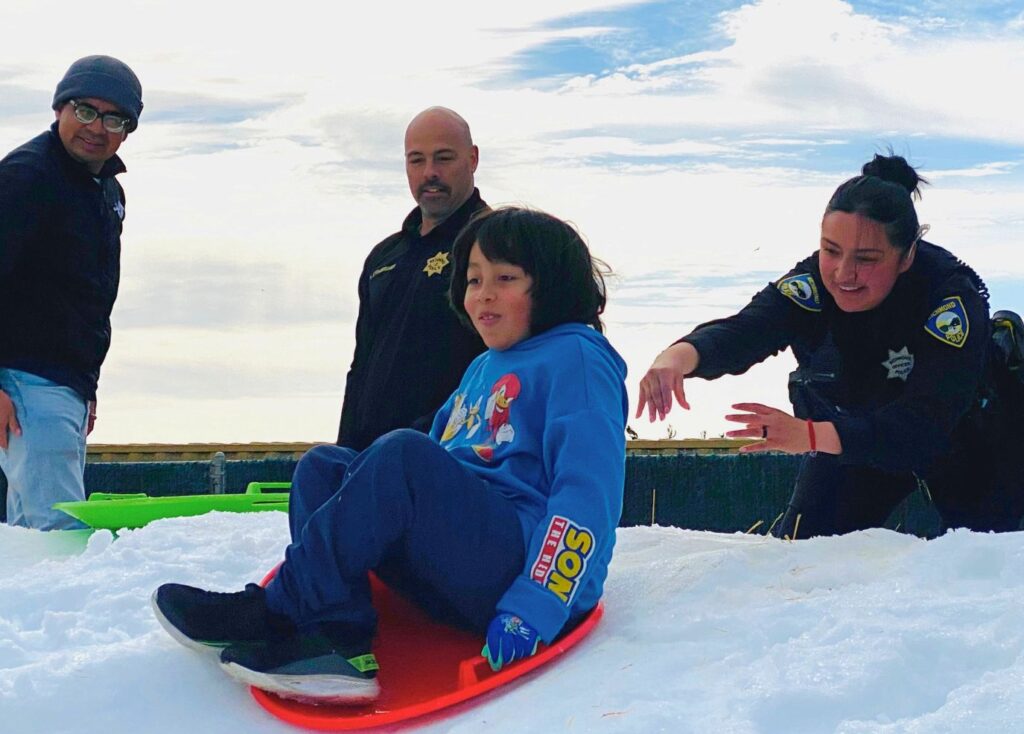 Postponed twice by weather, kids finally get their Snow Day at Nicholl Park