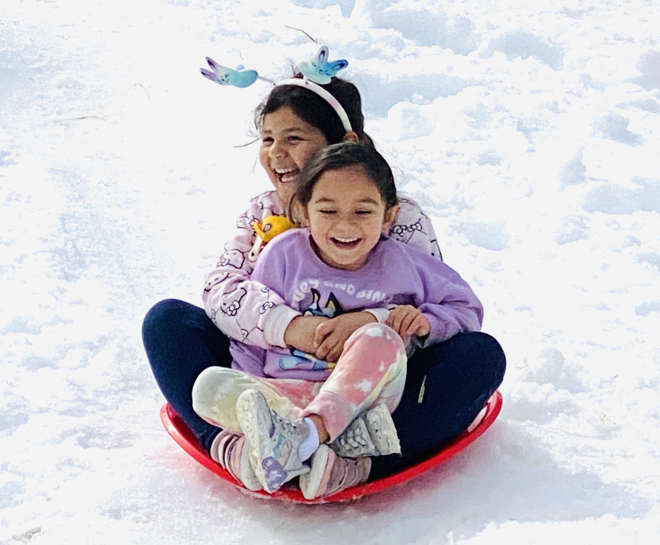 Postponed twice by weather, kids finally get their Snow Day at Nicholl Park