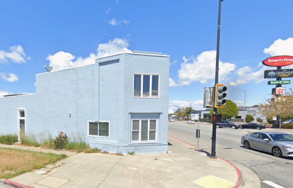 The San Pablo Planning Commission this week approved a STIIIZY cannabis dispensary at 13041 San Pablo Ave,, situated at the corner of Rheem Avenue. The approval involves renovating a 7,639-square-foot vacant building that formerly housed a church and a door showroom. STIIIZY secured this location through a competitive process following the 2024 passage of Measure M, which permits up to three cannabis retailers in the city. The company obtained an operator permit on March 19 after reviews by the police department and city attorney. Officials noted the project will occupy a long-vacant space and generate new tax revenue. The commission granted approval despite opposition from community members and representatives of the Islamic Society of West Contra Costa County, which operates a mosque across the street. Residents and mosque members expressed concerns regarding the dispensary's proximity to their facility and local schools. Critics specifically highlighted potential traffic impacts and the visibility of cannabis retail to youth. City staff said the location maintains all required legal distances from schools and other cannabis businesses.  The project remains subject to appeal to the City Council. The plans have STIIIZY operating on the ground floor while keeping the second floor closed to the public. The site plan includes a secured lobby for mandatory identification checks, updated landscaping, and new exterior paint. Security measures developed with the San Pablo Police Department include 24-hour high-definition surveillance with a live feed for law enforcement. The building will also feature reinforced interior walls and exterior bollards to prevent vehicle intrusions. An automated online ordering and pickup system will be implemented to minimize customer wait times. STIIIZY expects to hire 15 to 25 employees and is unionized with the UFCW. The company committed to a community benefit fund consisting of 1 percent  of gross revenue to support local initiatives. The shop plans to operate daily from 8 a.m. to 10 p.m. and offer a variety of pre-packaged products including flower, extracts, vaporizers, and edibles.